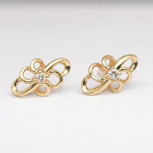 Swirl Diamond Stud Earrings in 14K Yellow Gold